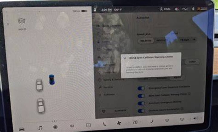 Does Tesla have blind spot warning?