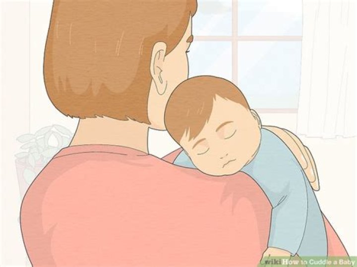 How do you cuddle a baby to sleep?