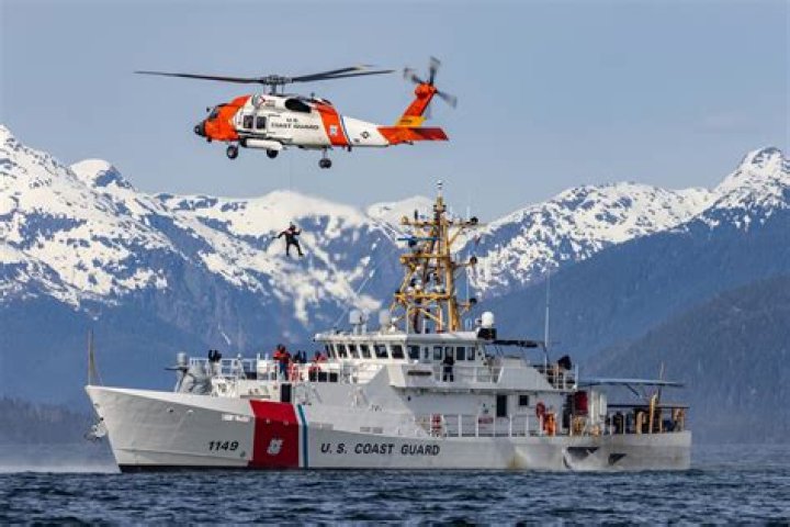 What rank commands a Coast Guard cutter?
