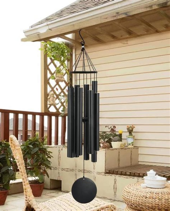 Where should wind chimes be placed outside?